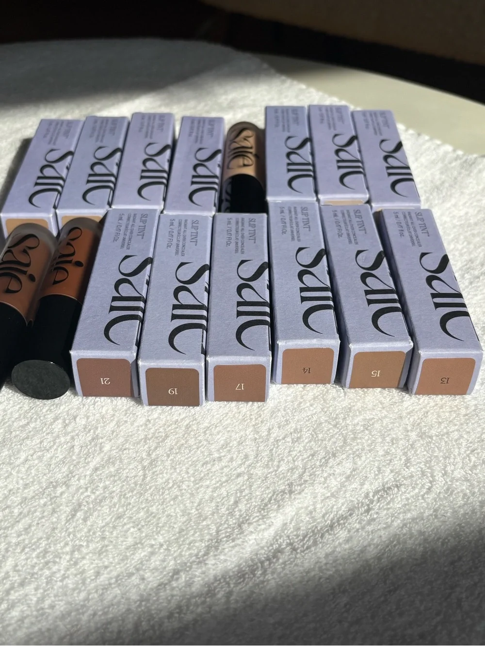 Saie Slip Tint Lipstick Collection — Nude and Warm Brown Shades